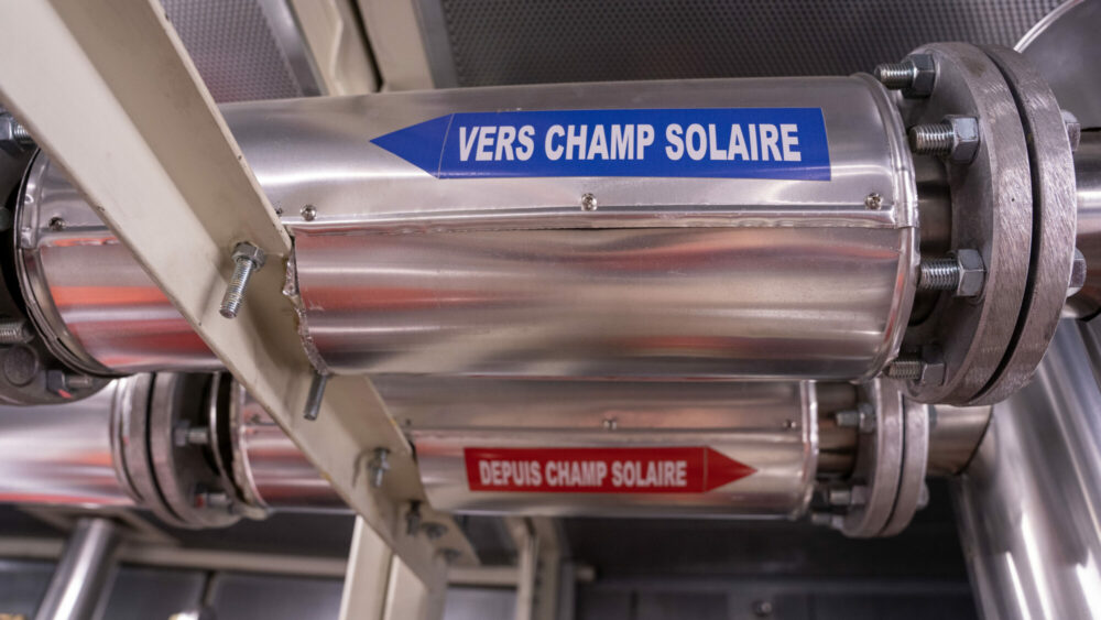 Pipes carrying the heat liquid to and from the thermal plant